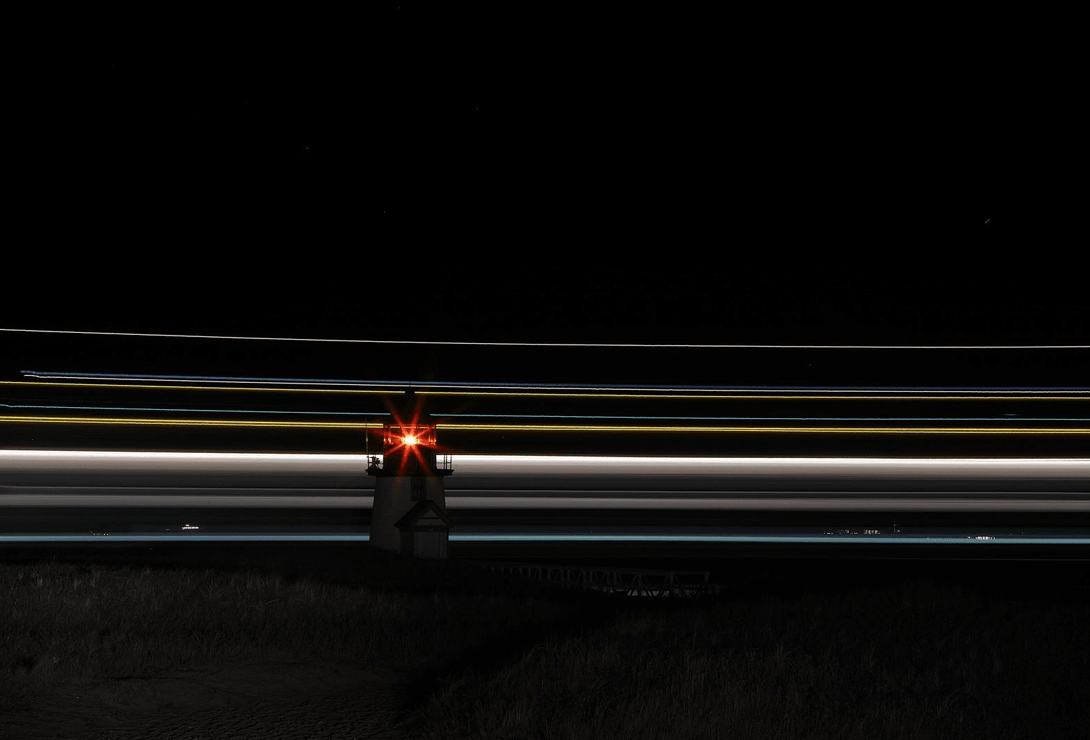 Lighthouse with light trails
